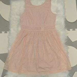 Blush lace dress with cutout waist